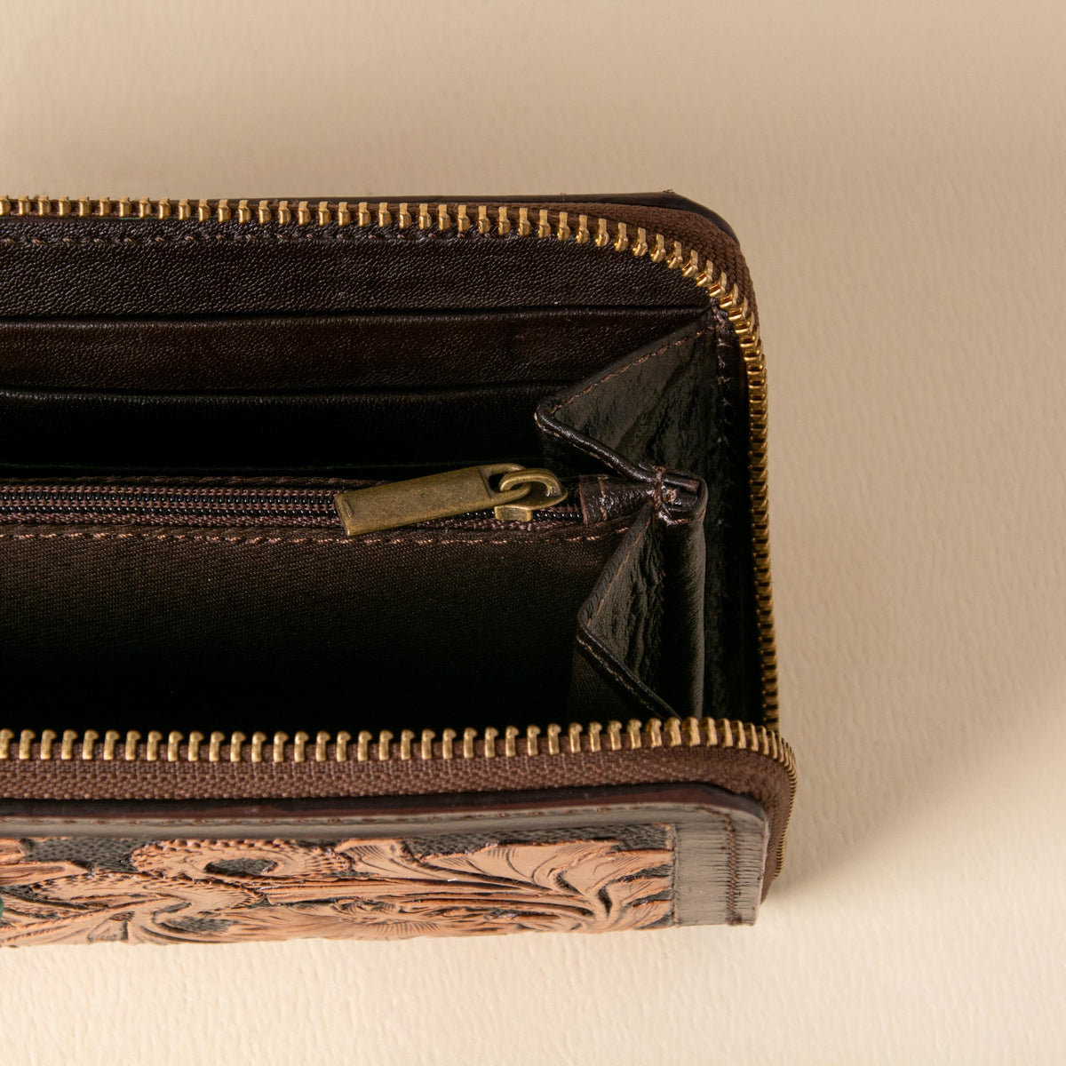 Hand-tooled leather zip-around wallet with cognac floral scrollwork on black leather, photo 6
