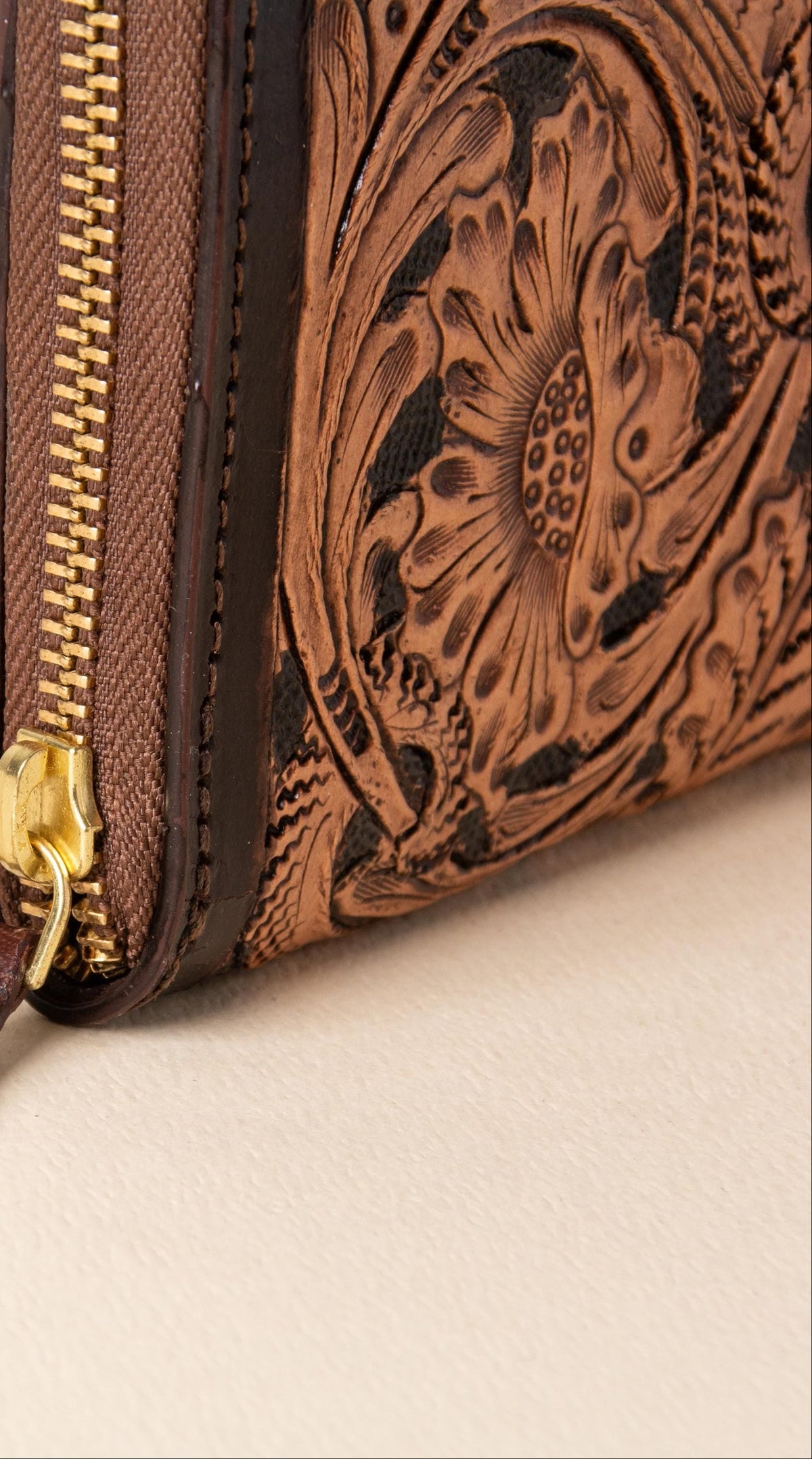Hand-tooled leather zip-around wallet with cognac floral scrollwork on black leather, photo 5