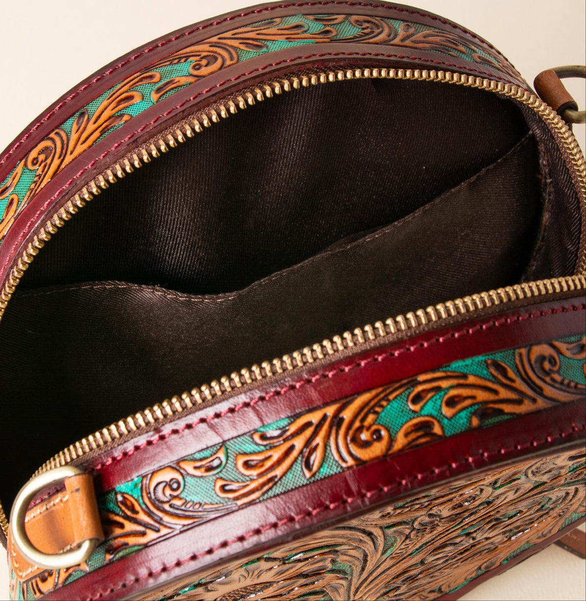 Hand-tooled leather round canteen crossbody bag with turquoise floral scrollwork, photo 4