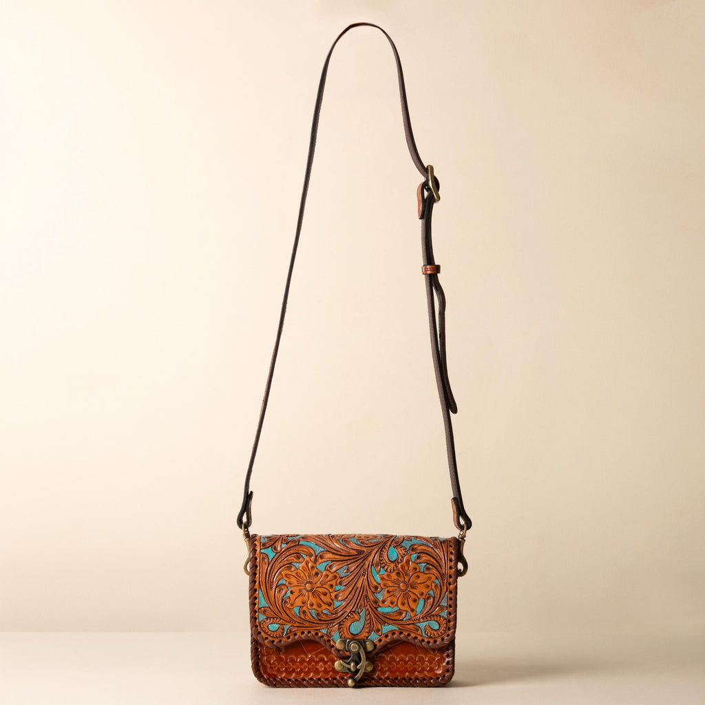 Hand-tooled leather flap crossbody bag with turquoise floral tooling and braided edge, photo 9