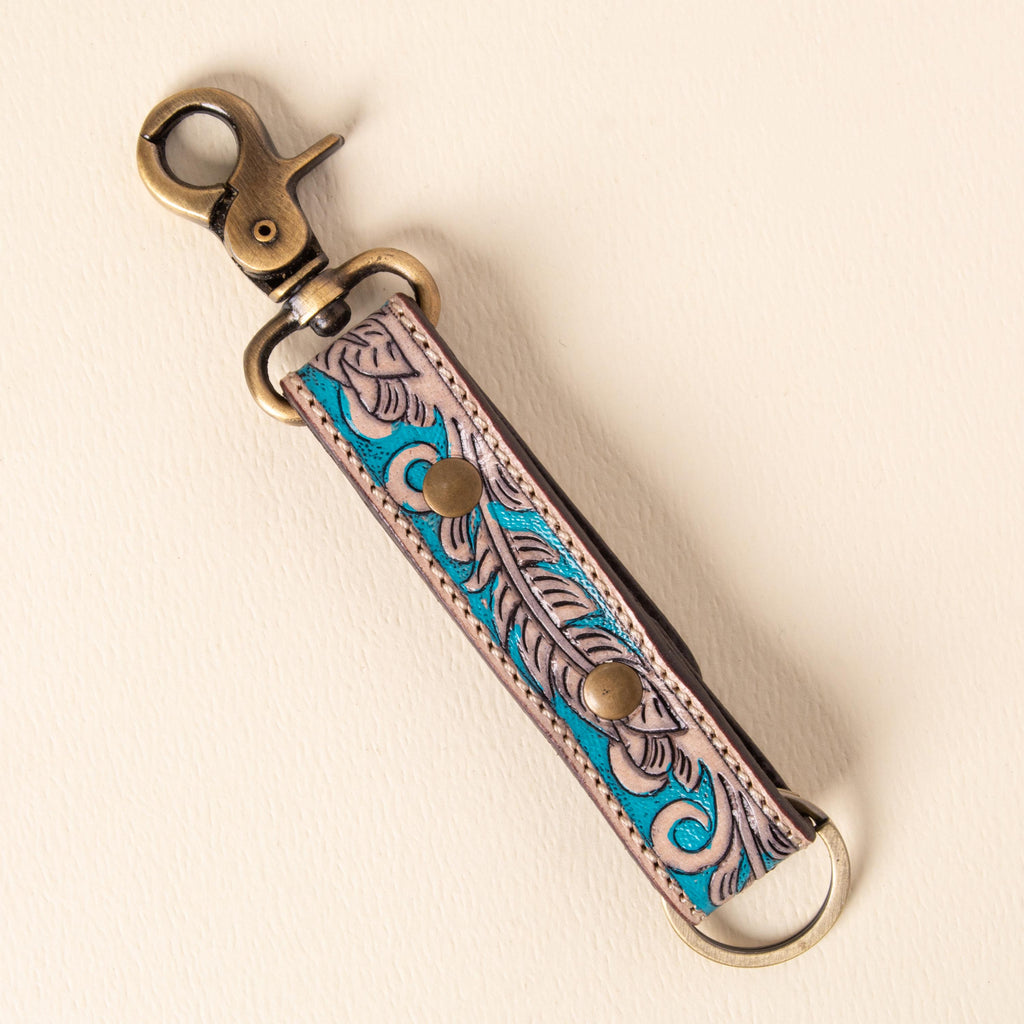 Hand-tooled leather floral keychains with feather, vine and sunflower designs, photo 3