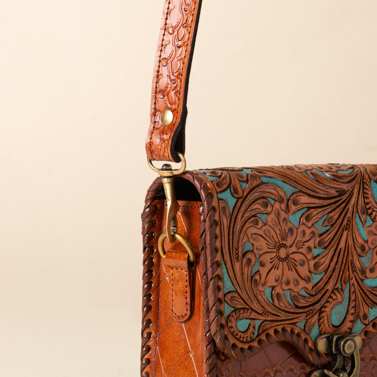 Hand-tooled leather flap crossbody bag with turquoise floral tooling and braided edge, photo 6