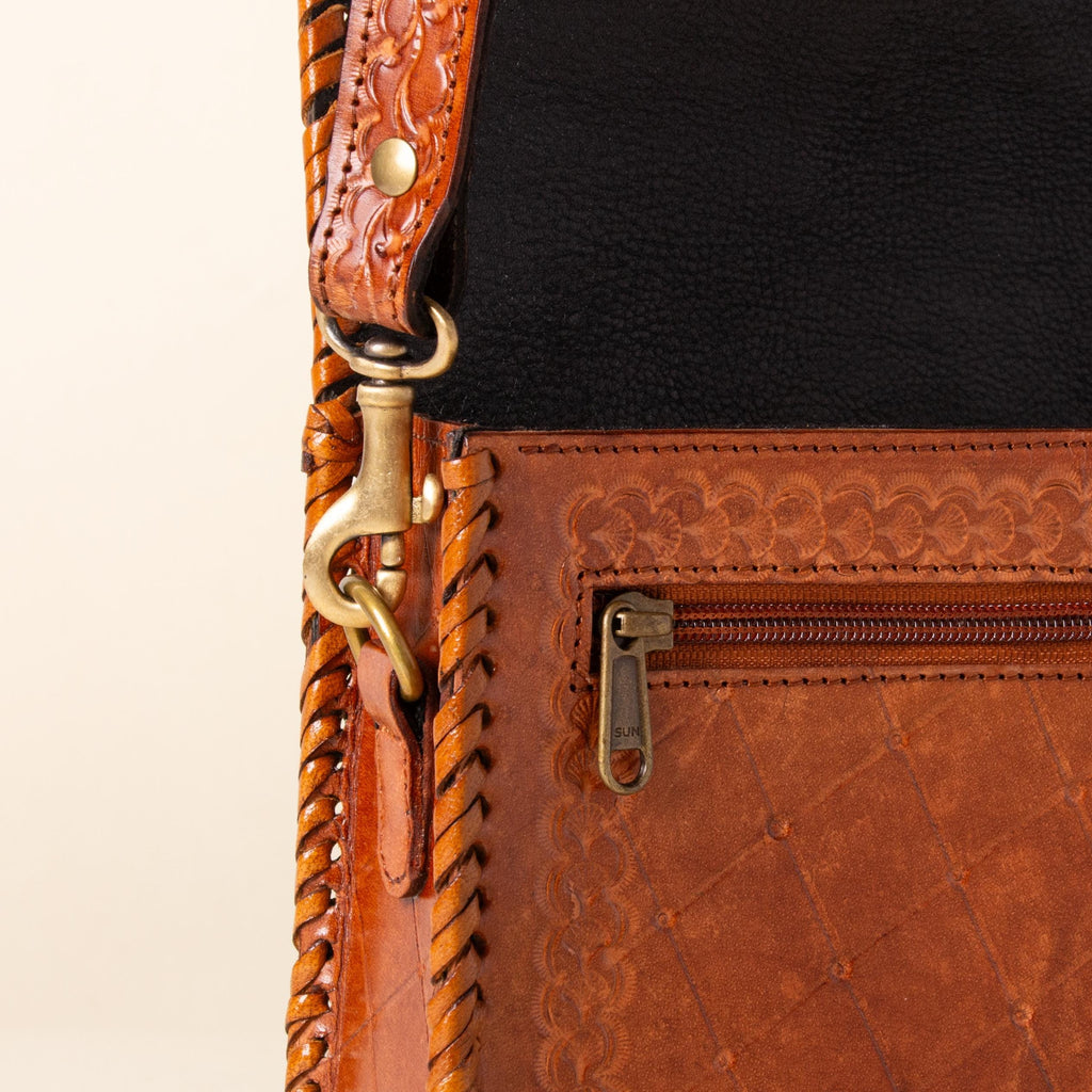 Hand-tooled leather crossbody bag with four floral medallions and braided edge, photo 9