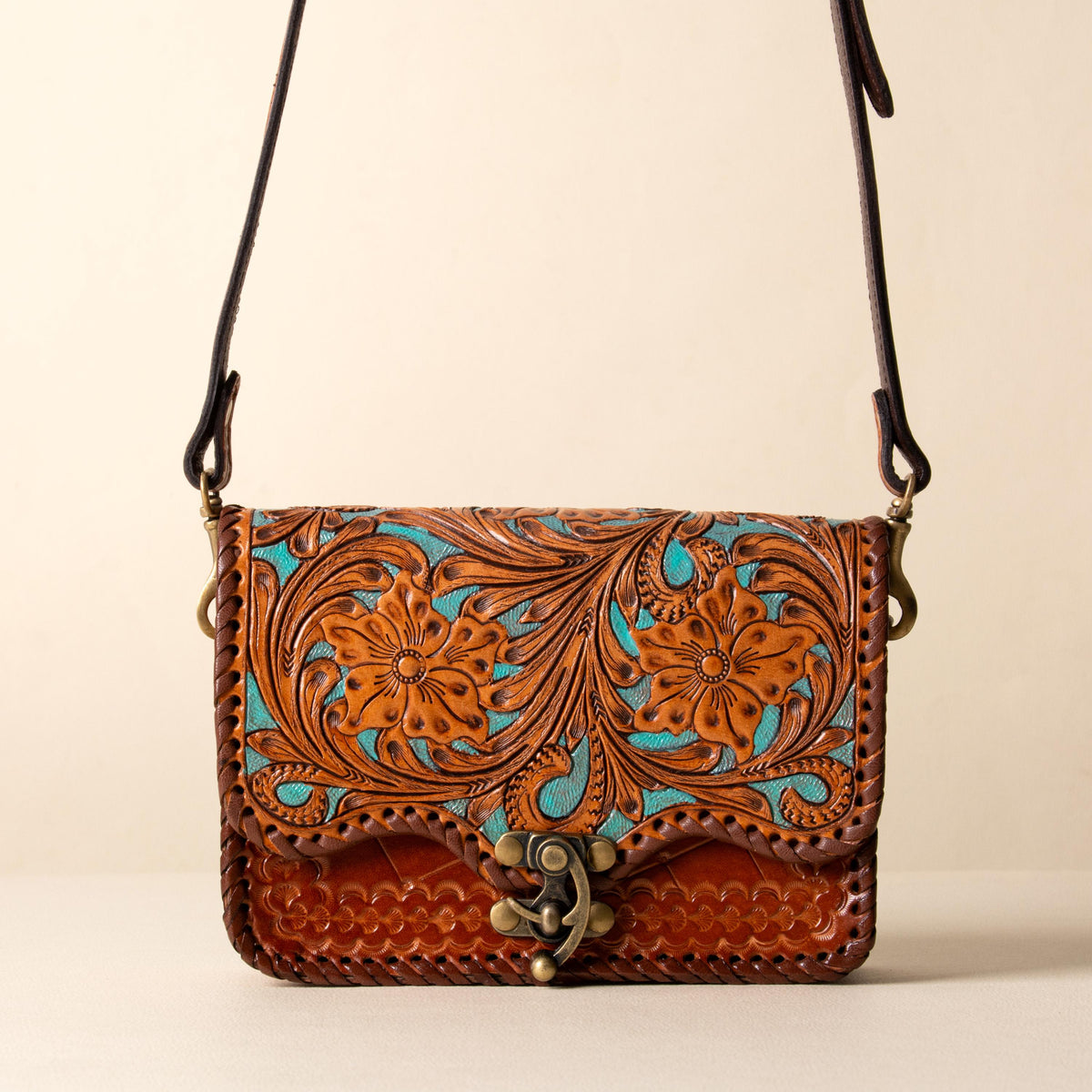 Hand-tooled leather flap crossbody bag with turquoise floral tooling and braided edge, photo 2