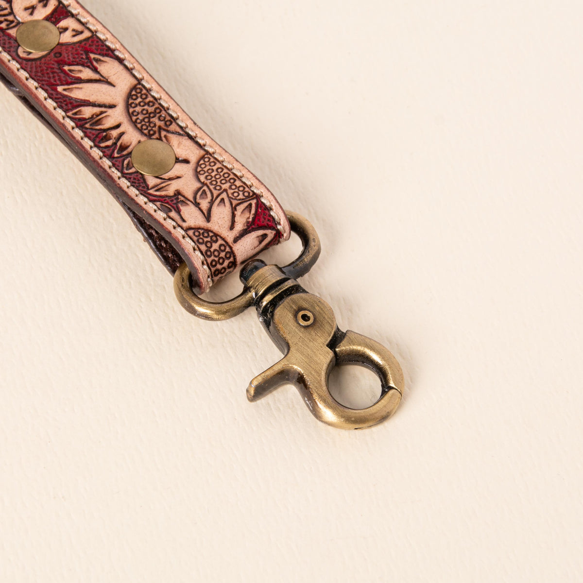 Hand-tooled leather floral keychains with feather, vine and sunflower designs, photo 7