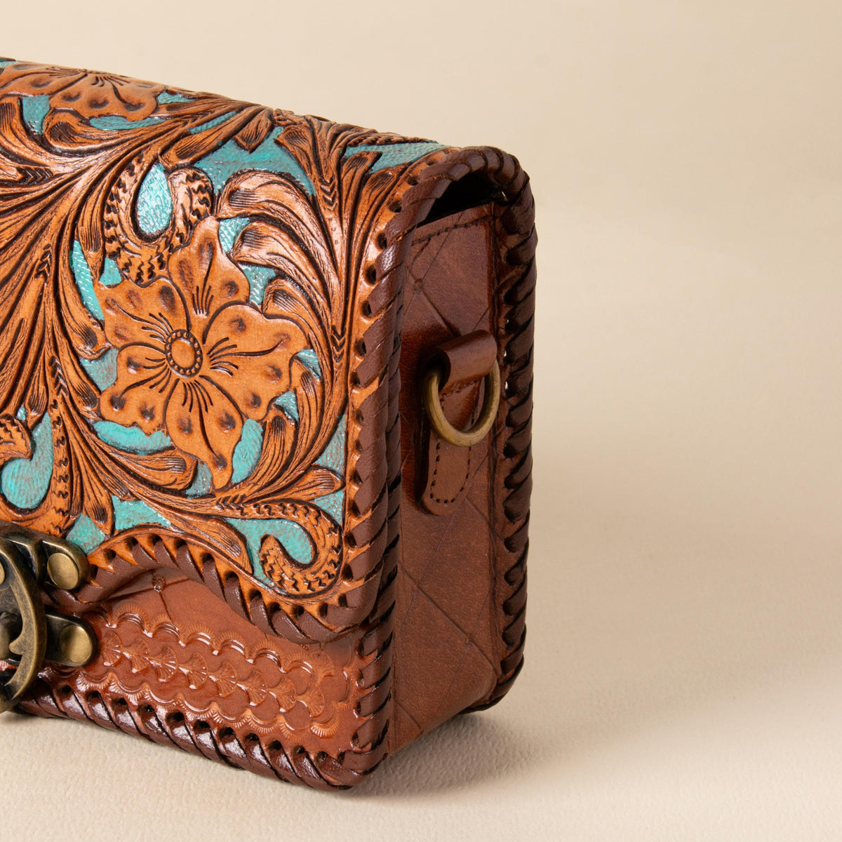 Hand-tooled leather flap crossbody bag with turquoise floral tooling and braided edge, photo 8
