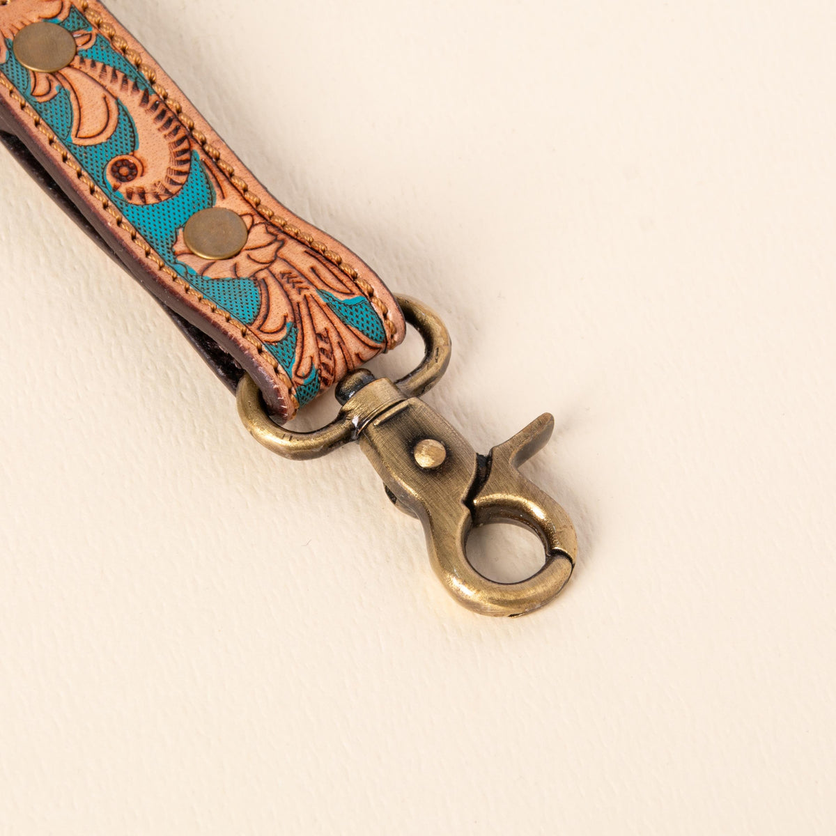 Hand-tooled leather floral keychains with feather, vine and sunflower designs, photo 8