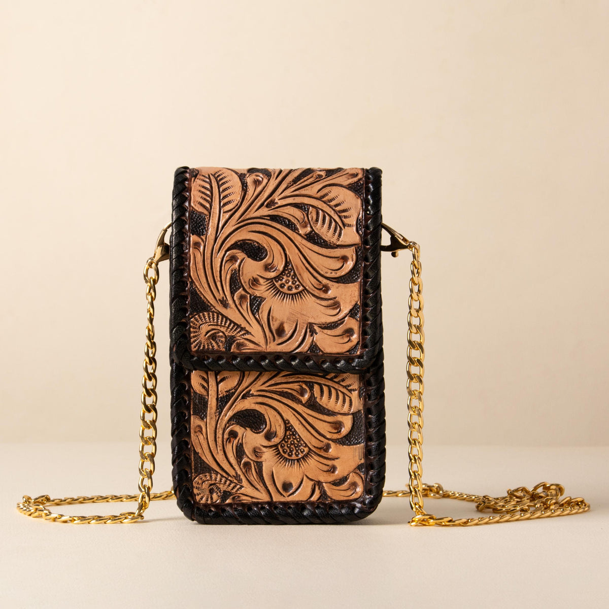 Hand-tooled leather phone bag with western floral design and gold-tone chain strap, photo 1