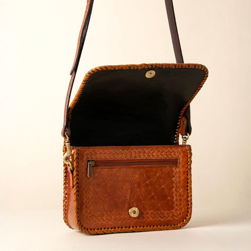 Hand-tooled leather crossbody bag with four floral medallions and braided edge, photo 2