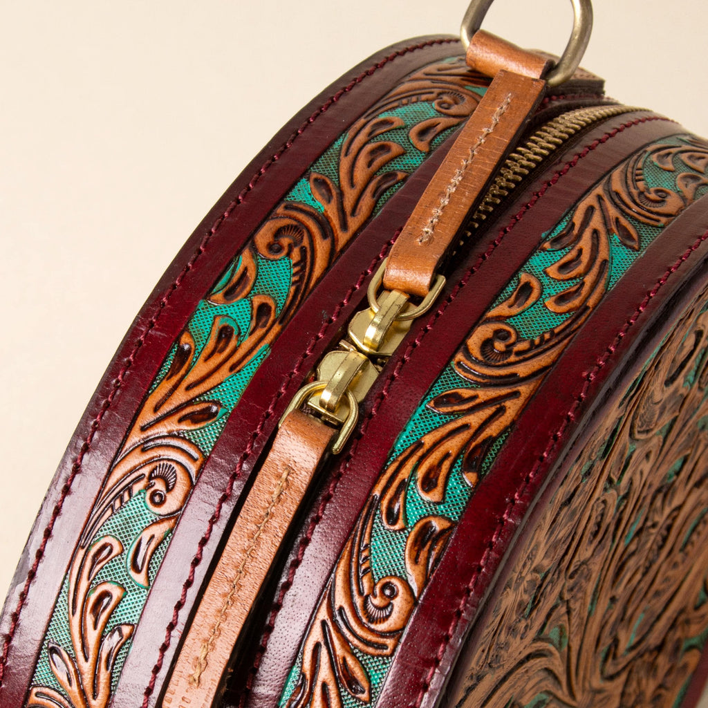 Hand-tooled leather round canteen crossbody bag with turquoise floral scrollwork, photo 2