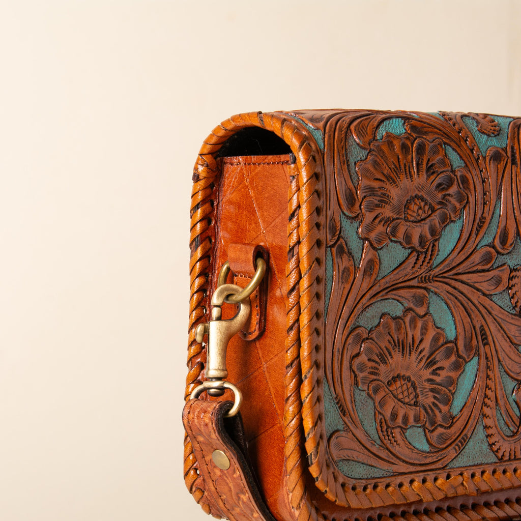 Hand-tooled leather crossbody bag with four floral medallions and braided edge, photo 10