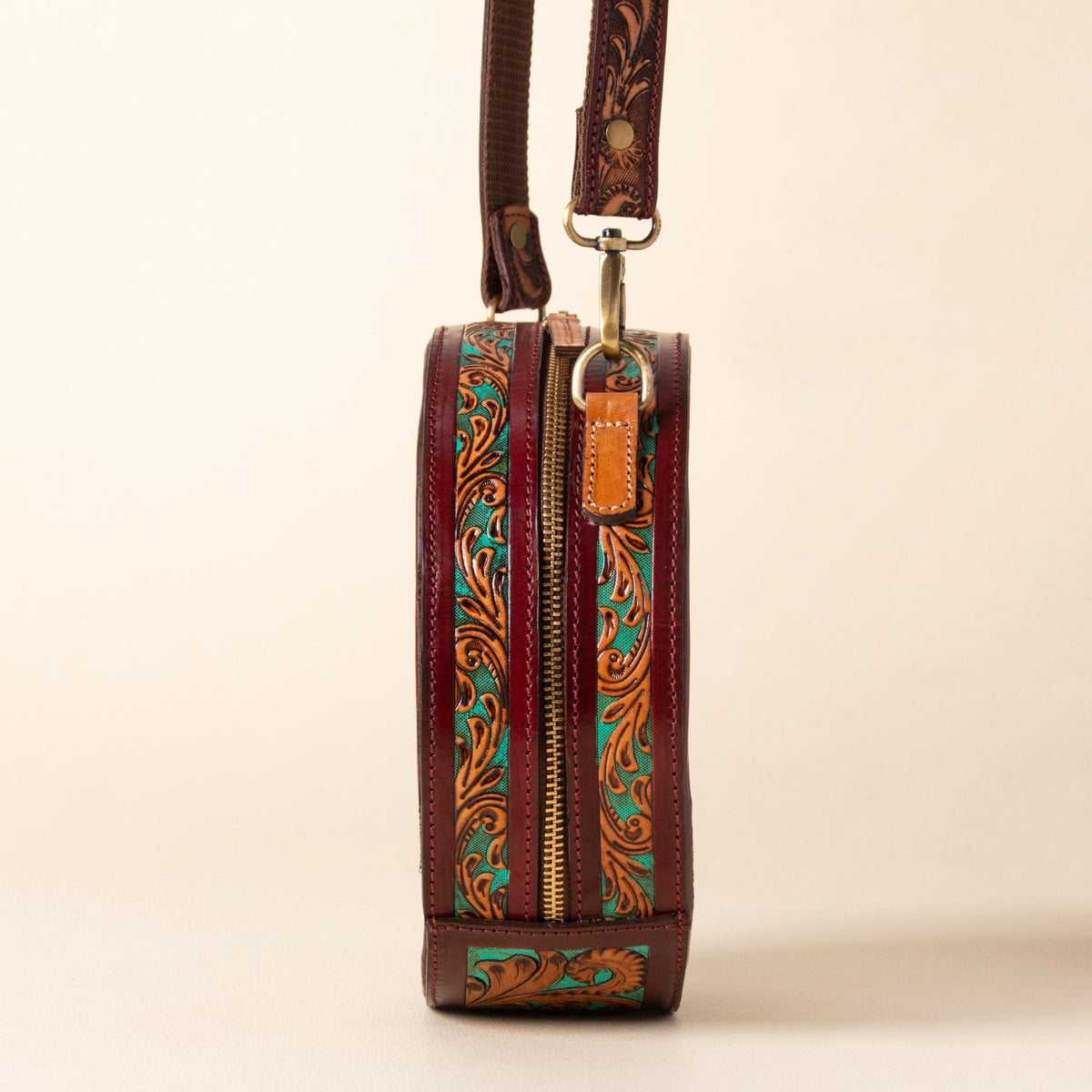 Hand-tooled leather round canteen crossbody bag with turquoise floral scrollwork, photo 3