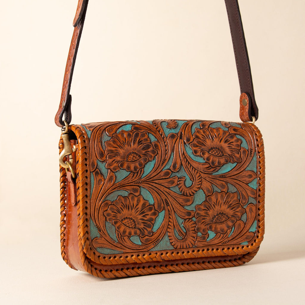 Hand-tooled leather crossbody bag with four floral medallions and braided edge, photo 6