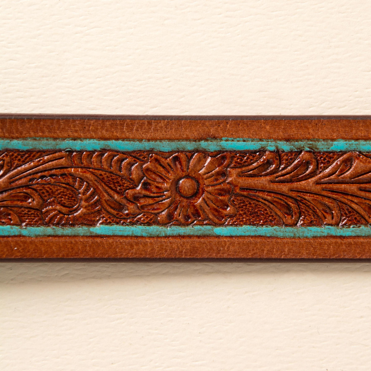 Hand-tooled leather western belt with floral design, turquoise pinstripe and silver buckle, photo 4